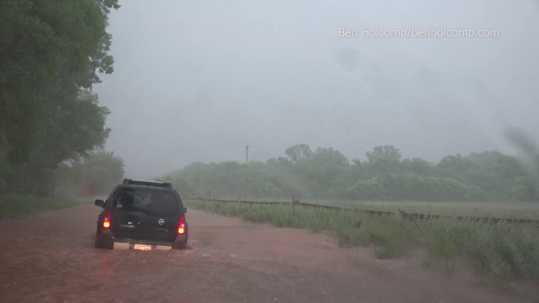 Car drives into flooding